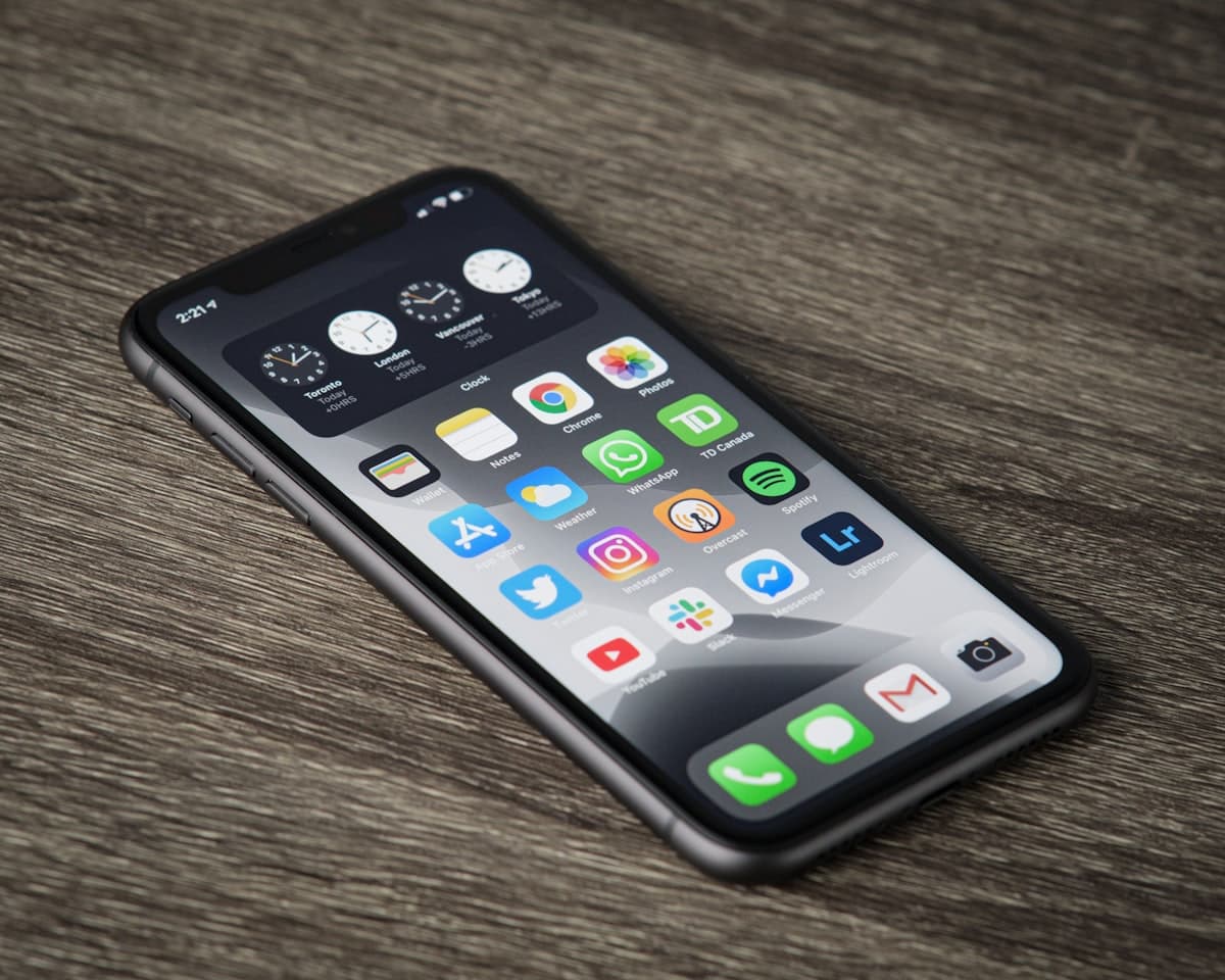 Frustrated small business owner reviewing a slow website on a mobile phone — common conversion mistake for Lake Havasu City local businesses
